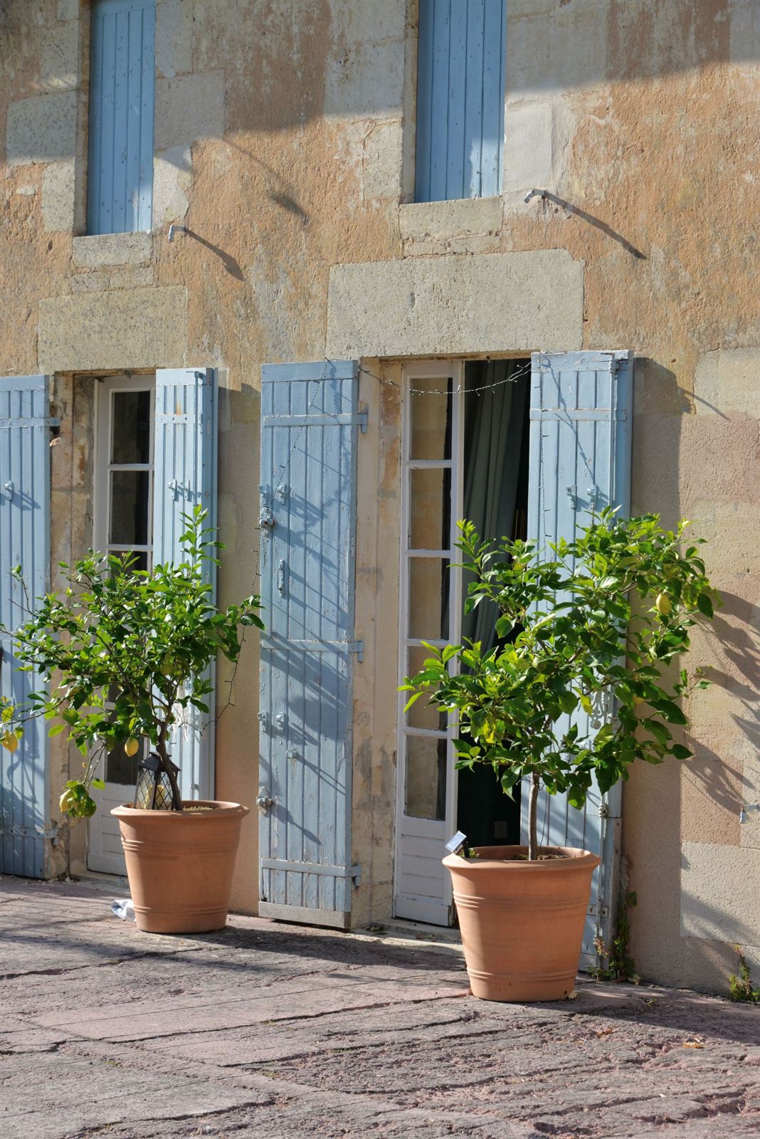 Façade provençale aux volets bleus (photo d'illustration)